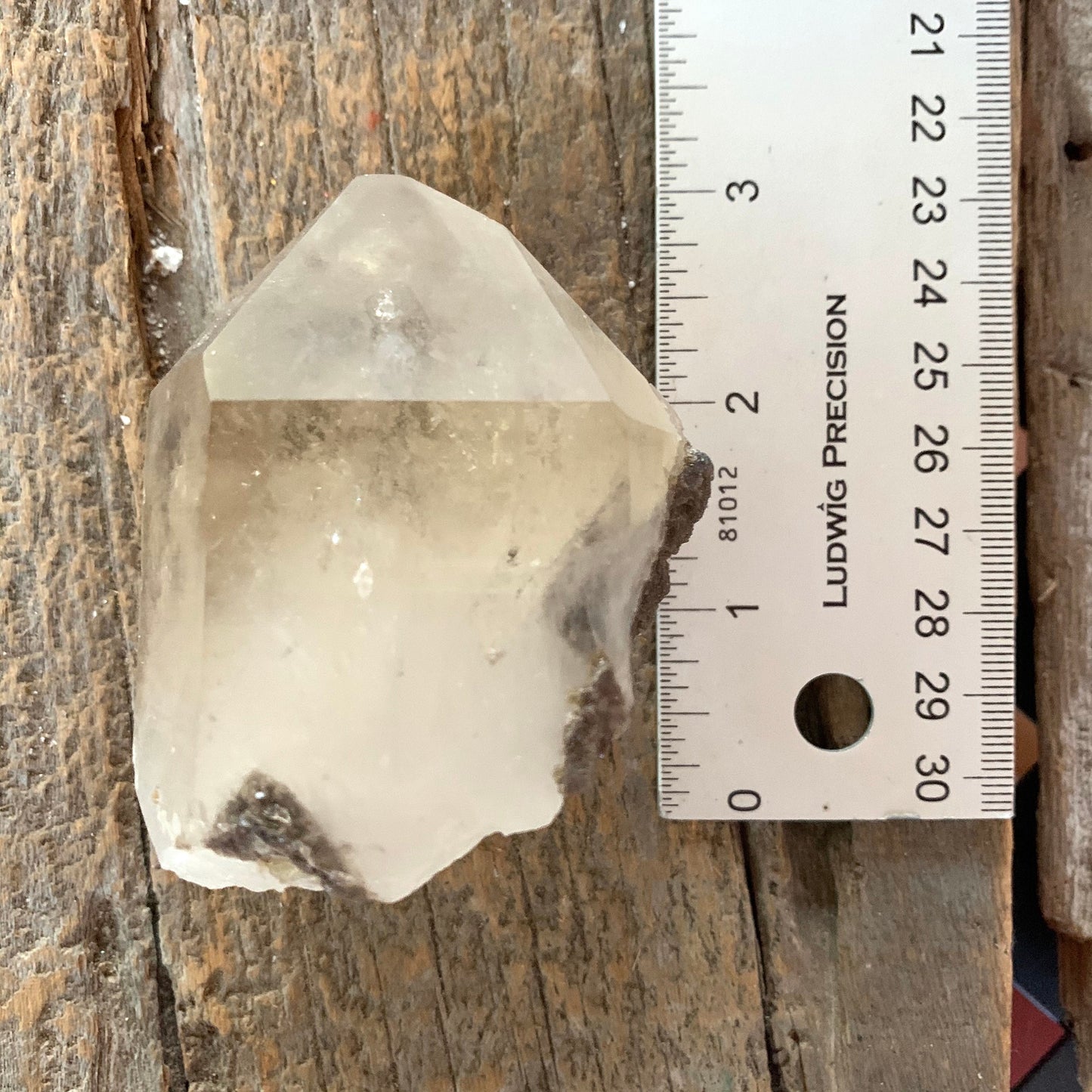 Beautiful Brazilian Quartz Point with Mica and a Phantom 215g From Minas Gerais Brazil