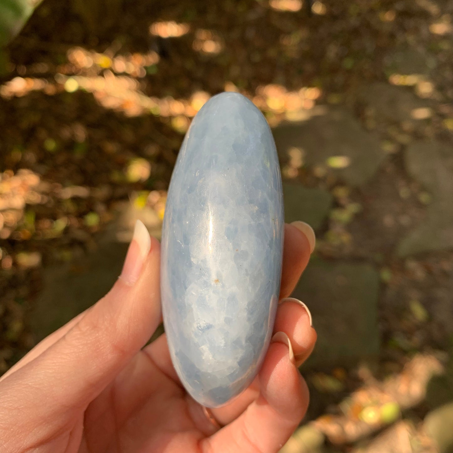 Medium Blue Calcite Palm Stone Madagascar 209g