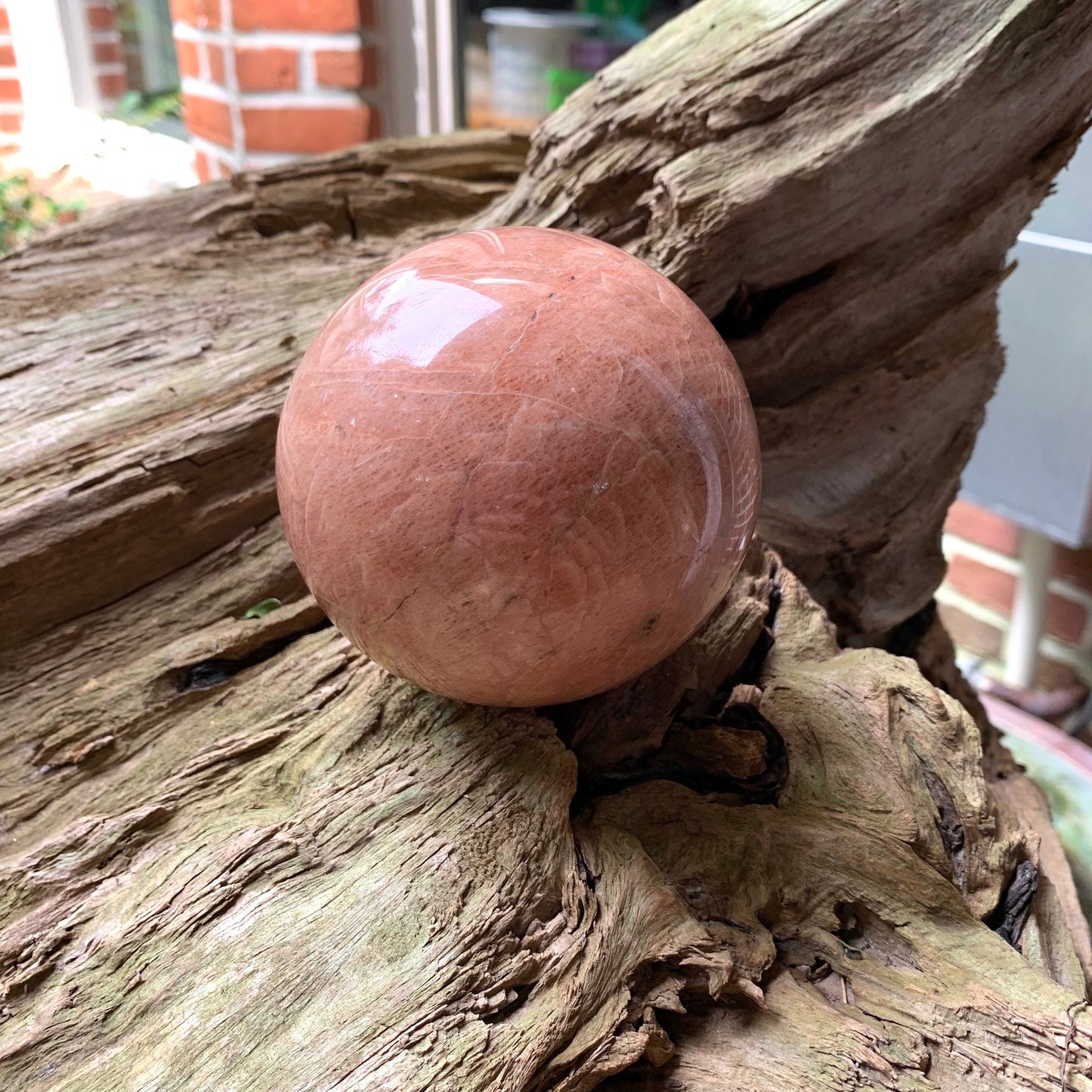 Polished Peach Moonstone Sphere 895g 88mm 3.48" with Wood Stand From Madagascar Specimen